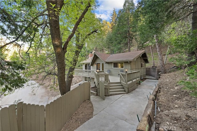 990 Nesthorn Dr, Crestline, CA 92325 - chalet / cabin featuring a wooden deck and a chimney