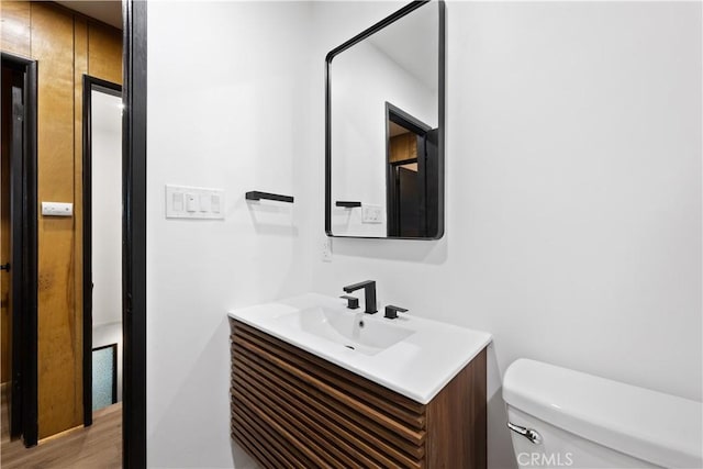 990 Nesthorn Dr, Crestline, CA 92325 - half bathroom with vanity and wood finished floors