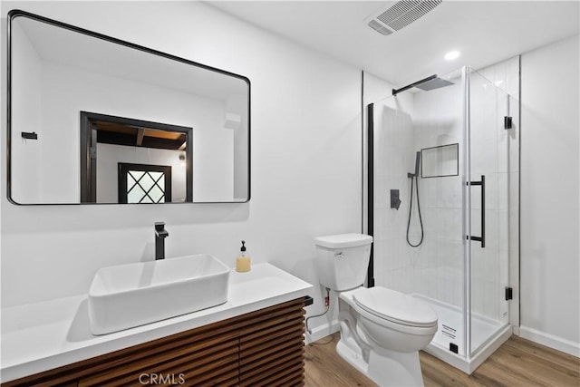 990 Nesthorn Dr, Crestline, CA 92325 - bathroom with vanity, wood finished floors, and a shower stall