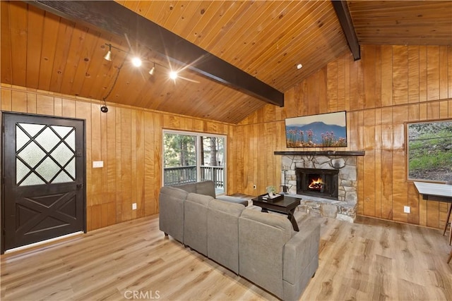 990 Nesthorn Dr, Crestline, CA 92325 - living area featuring wood finished floors, wood walls, wood ceiling, and a stone fireplace