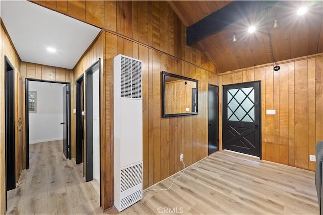 990 Nesthorn Dr, Crestline, CA 92325 - entrance foyer with a heating unit, wood finished floors, wooden walls, and wooden ceiling