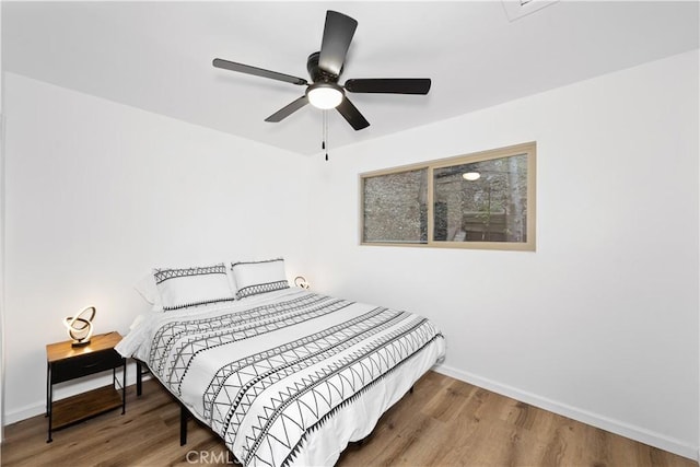 990 Nesthorn Dr, Crestline, CA 92325 - bedroom featuring wood finished floors and ceiling fan