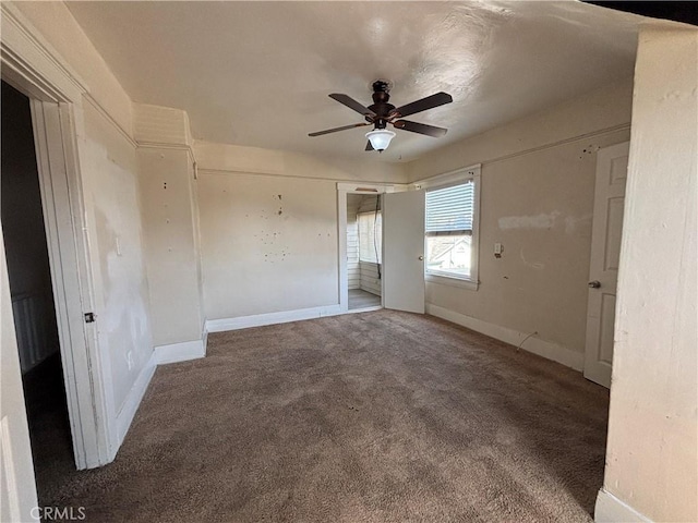 1646 Cimarron St, Los Angeles, CA 90019 - unfurnished bedroom featuring carpet floors and a ceiling fan