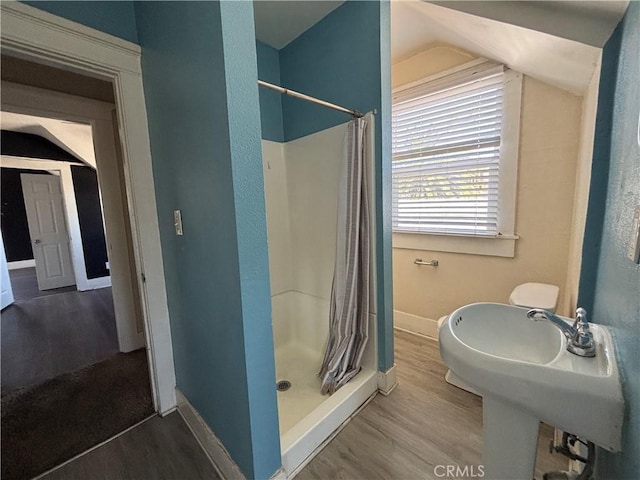 1646 Cimarron St, Los Angeles, CA 90019 - full bath with wood finished floors, a stall shower, and lofted ceiling