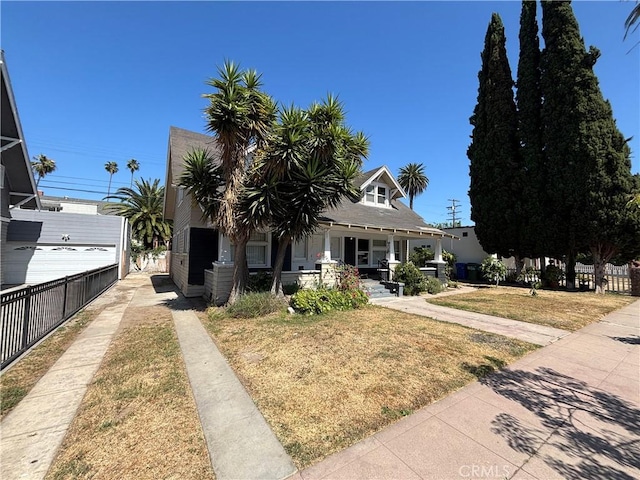 1646 Cimarron St, Los Angeles, CA 90019 - view of front of home featuring covered porch