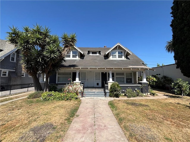 1646 Cimarron St, Los Angeles, CA 90019 - view of front of house featuring covered porch