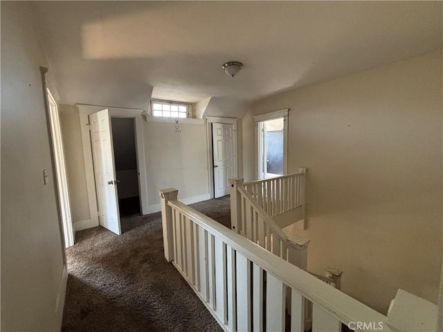 1646 Cimarron St, Los Angeles, CA 90019 - corridor featuring an upstairs landing and dark colored carpet