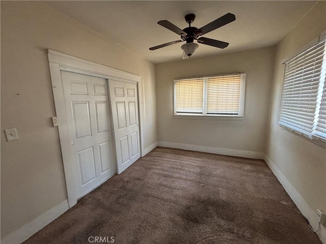 1646 Cimarron St, Los Angeles, CA 90019 - unfurnished bedroom featuring carpet flooring, a closet, and a ceiling fan