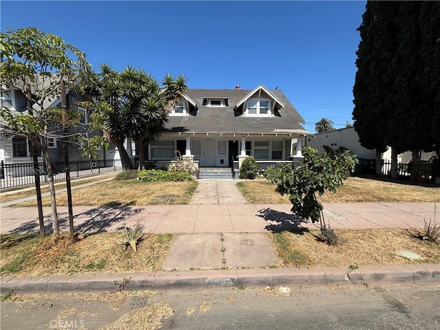 1646 Cimarron St, Los Angeles, CA 90019 - view of front of house featuring a porch