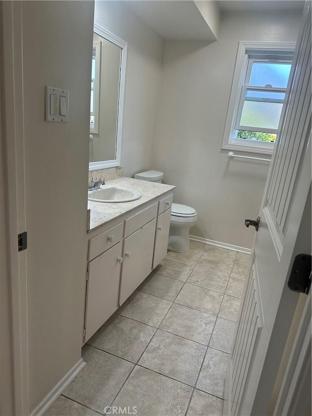 22943 Maple Ave Unit A, Torrance, CA 90505 - half bath featuring vanity and tile patterned flooring