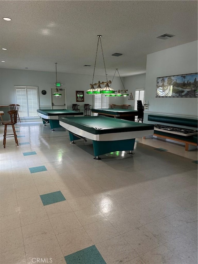 22943 Maple Ave Unit A, Torrance, CA 90505 - recreation room with billiards table, healthy amount of natural light, a textured ceiling, tile patterned floors, and recessed lighting