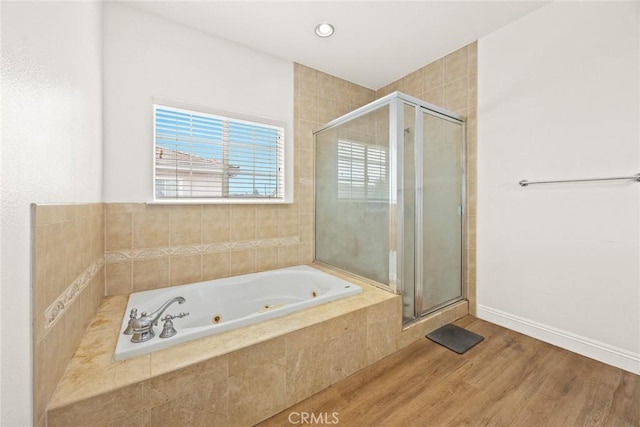 3453 Ivar Ave, Rosemead, CA 91770 - full bath with a shower stall, a jetted tub, and wood finished floors
