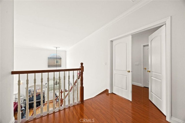 3453 Ivar Ave, Rosemead, CA 91770 - corridor featuring an upstairs landing, wood finished floors, and ornamental molding