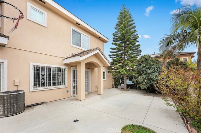 3453 Ivar Ave, Rosemead, CA 91770 - rear view of property featuring stucco siding and a patio