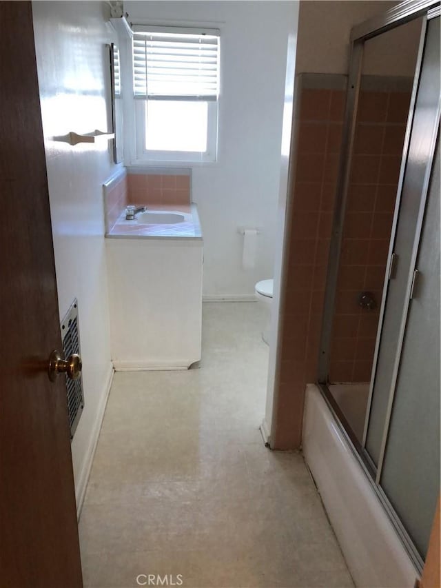 12961 Panama St, Los Angeles, CA 90066 - bathroom featuring vanity, shower / bath combination with glass door, and heating unit