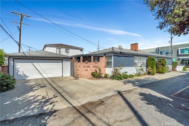 12961 Panama St, Los Angeles, CA 90066 - view of front facade featuring a chimney and an outdoor structure