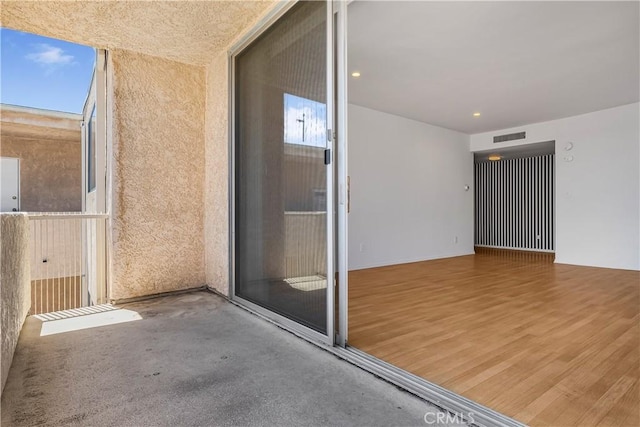 5429 Newcastle Ave Unit 309, Encino, CA 91316 - property entrance with stucco siding and a balcony