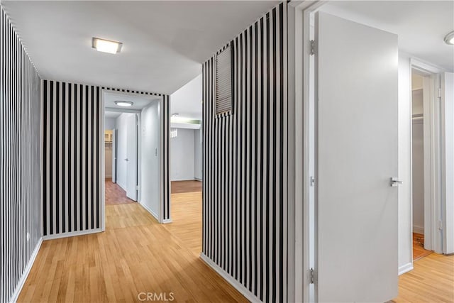 5429 Newcastle Ave Unit 309, Encino, CA 91316 - hall featuring light wood finished floors