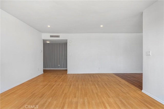 5429 Newcastle Ave Unit 309, Encino, CA 91316 - unfurnished room with light wood-type flooring and recessed lighting