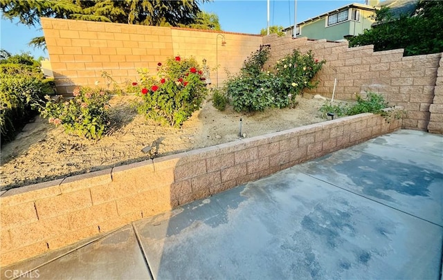 325 Deodar St, Redlands, CA 92374 - fenced backyard with a patio area
