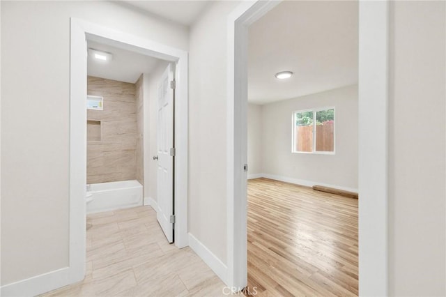 123 W 56th St, Los Angeles, CA 90037 - hallway with baseboards