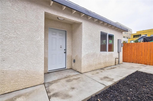 123 W 56th St, Los Angeles, CA 90037 - entrance to property with stucco siding
