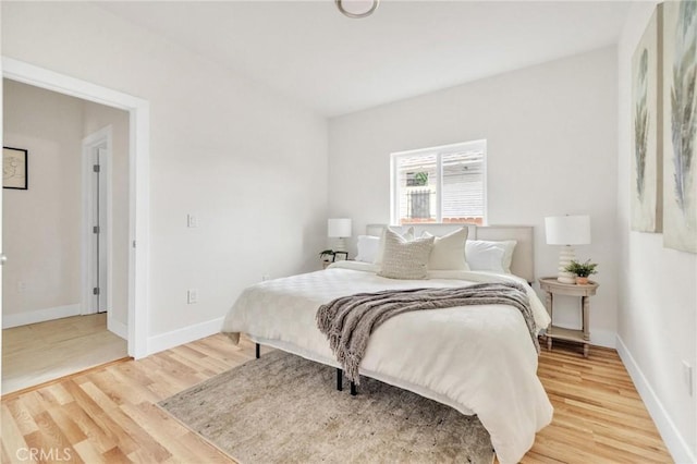 123 W 56th St, Los Angeles, CA 90037 - bedroom featuring light wood finished floors