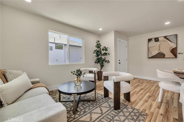 123 W 56th St, Los Angeles, CA 90037 - living room with recessed lighting and light wood-type flooring