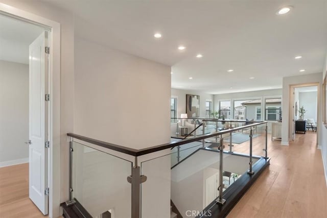 101 Mulberry Dr, Lake Forest, CA 92630 - corridor featuring an upstairs landing, recessed lighting, and light wood-style flooring