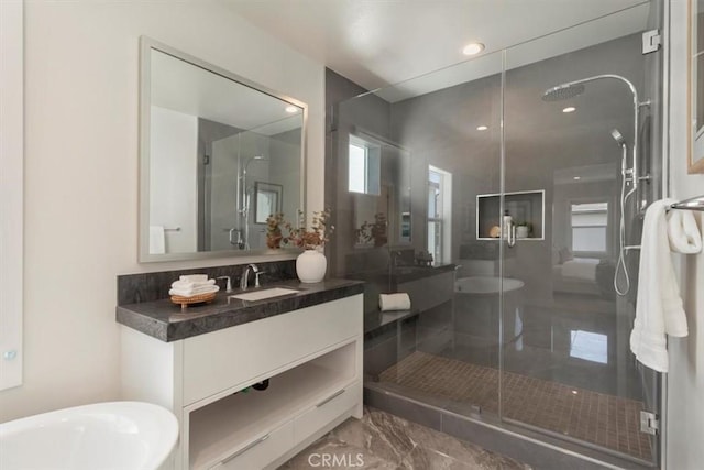 101 Mulberry Dr, Lake Forest, CA 92630 - bathroom featuring a shower stall, vanity, marble finish floors, a freestanding bath, and recessed lighting