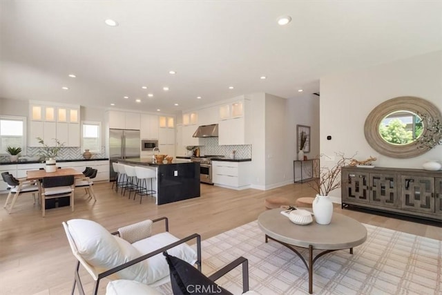 101 Mulberry Dr, Lake Forest, CA 92630 - living area featuring recessed lighting and light wood-style flooring