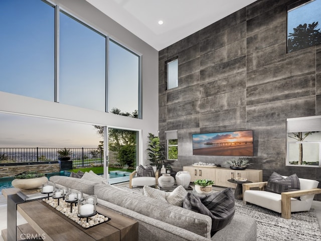 25 Remy Ln, Montebello, CA 90640 - living room with a high ceiling, recessed lighting, and an accent wall