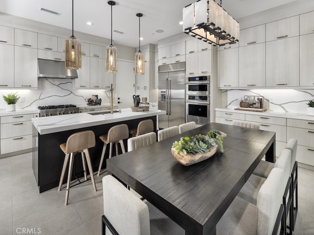 25 Remy Ln, Montebello, CA 90640 - dining room with recessed lighting and light tile patterned flooring