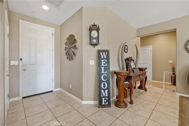 863 Legacy Dr, Lemoore, CA 93245 - foyer with light tile patterned floors and baseboards
