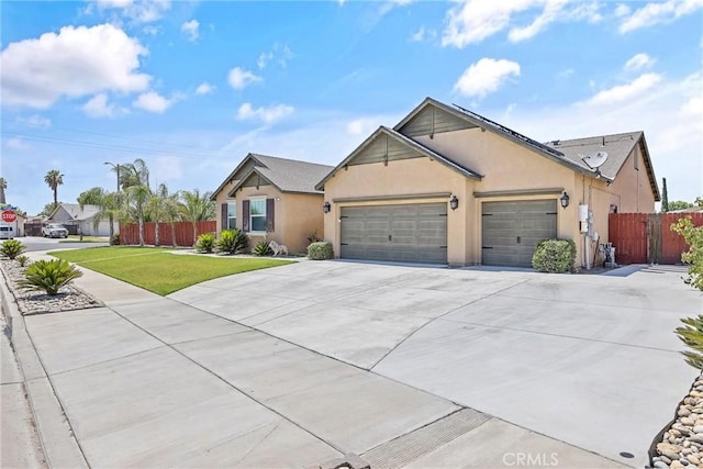 863 Legacy Dr, Lemoore, CA 93245 - ranch-style home featuring driveway, a garage, stucco siding, and solar panels