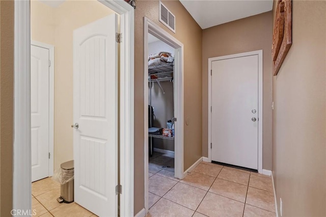 863 Legacy Dr, Lemoore, CA 93245 - hall with light tile patterned floors and baseboards