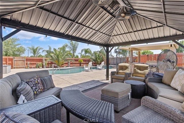 863 Legacy Dr, Lemoore, CA 93245 - fenced backyard with an outdoor living space, a gazebo, and a patio