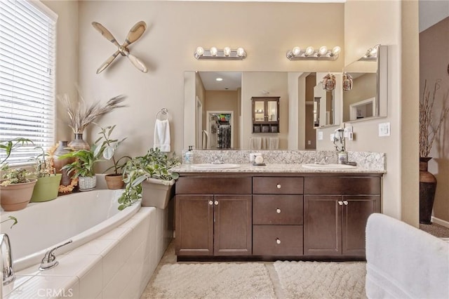 863 Legacy Dr, Lemoore, CA 93245 - bathroom with double vanity and a bath