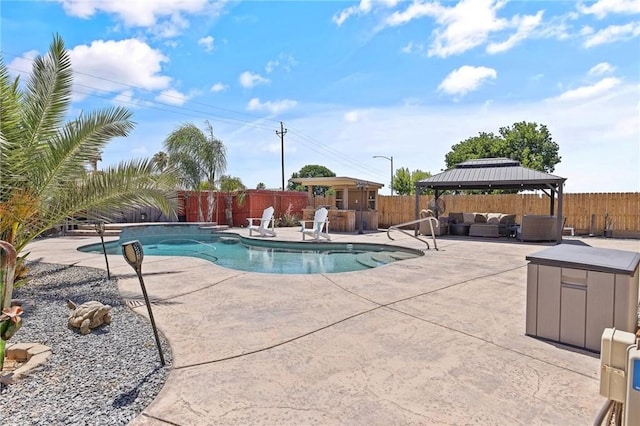 863 Legacy Dr, Lemoore, CA 93245 - view of swimming pool featuring a gazebo, an outdoor hangout area, a fenced backyard, and a patio area