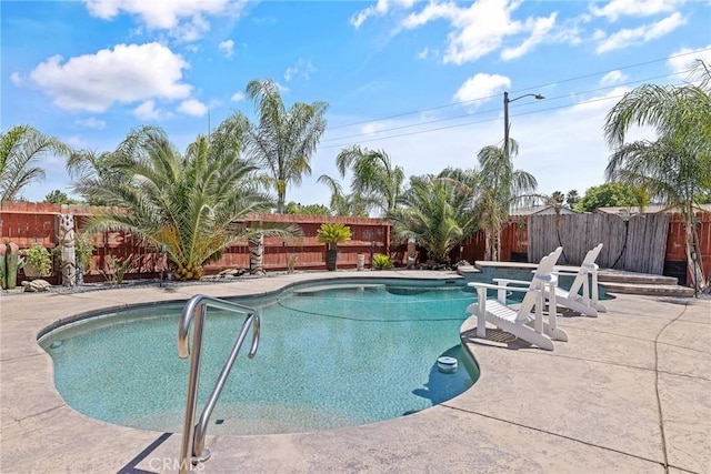 863 Legacy Dr, Lemoore, CA 93245 - view of pool with a fenced backyard and a patio area