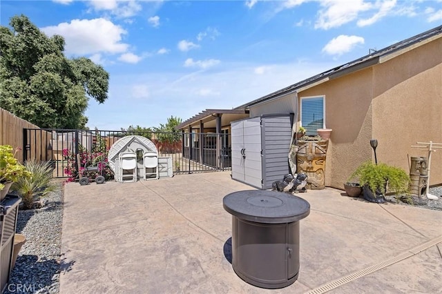 863 Legacy Dr, Lemoore, CA 93245 - fenced backyard with a patio