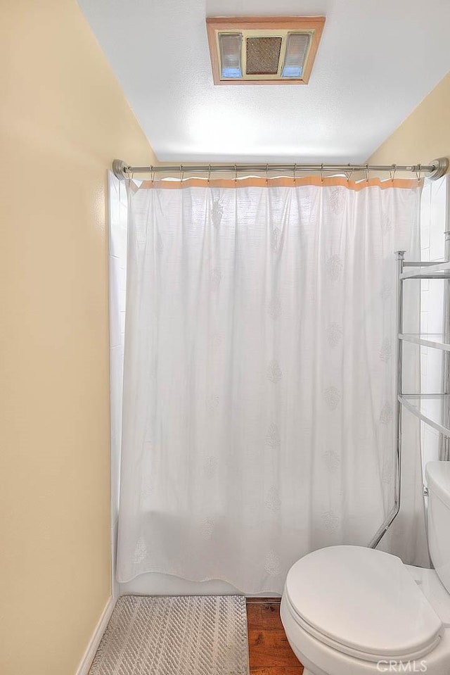 1842 Fern Hollow Dr, Diamond Bar, CA 91765 - full bathroom with toilet and wood finished floors
