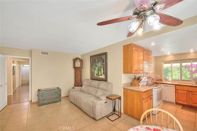 1842 Fern Hollow Dr, Diamond Bar, CA 91765 - living area featuring a ceiling fan and light tile patterned floors
