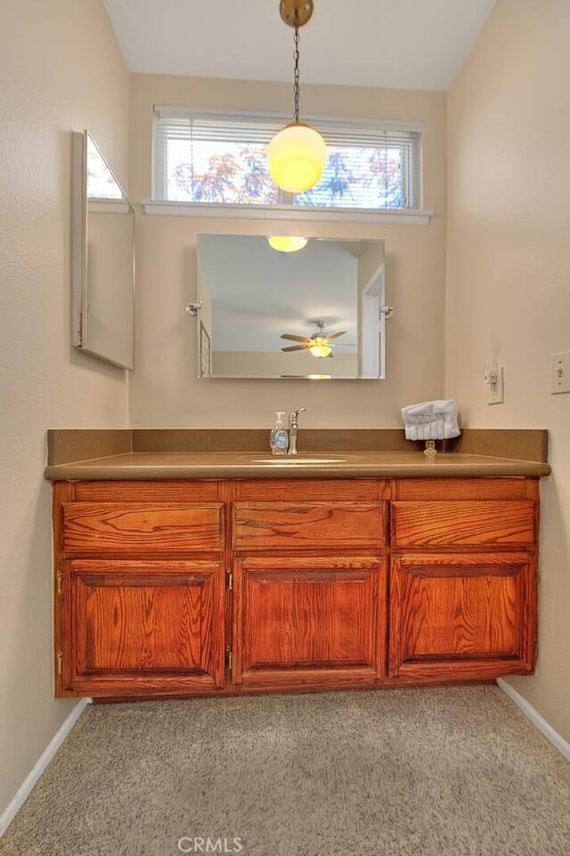 1842 Fern Hollow Dr, Diamond Bar, CA 91765 - bathroom featuring a ceiling fan, vanity, and healthy amount of natural light