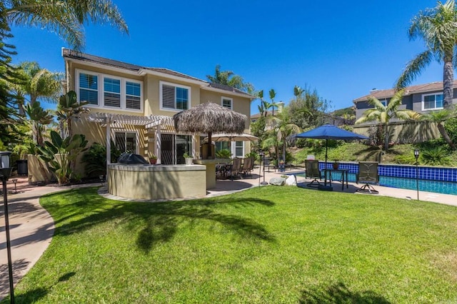 5146 Delaney Ct, Carlsbad, CA 92008 - rear view of property with a pergola, stucco siding, a lawn, a patio area, and an outdoor pool