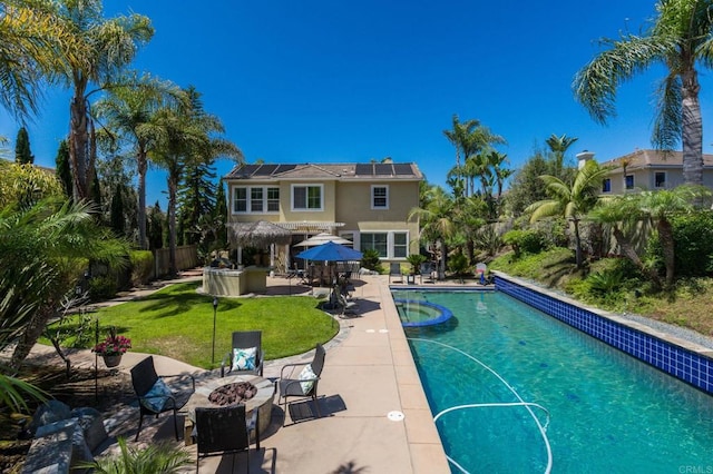 5146 Delaney Ct, Carlsbad, CA 92008 - view of pool featuring an outdoor fire pit, a patio area, a fenced backyard, and a pool with connected hot tub