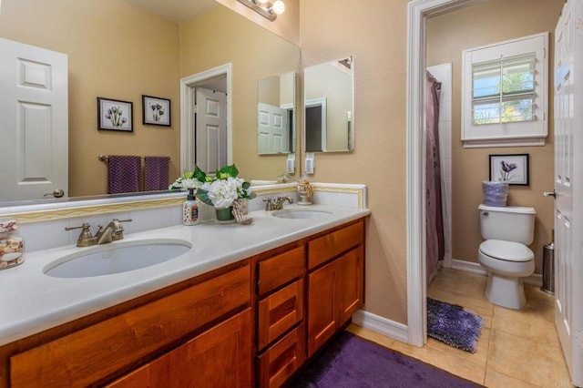 5146 Delaney Ct, Carlsbad, CA 92008 - bathroom with double vanity and tile patterned flooring