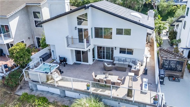 3208 Calle Grande, San Clemente, CA 92672 - rear view of house featuring an outdoor hangout area, stucco siding, a balcony, a patio area, and a fenced backyard