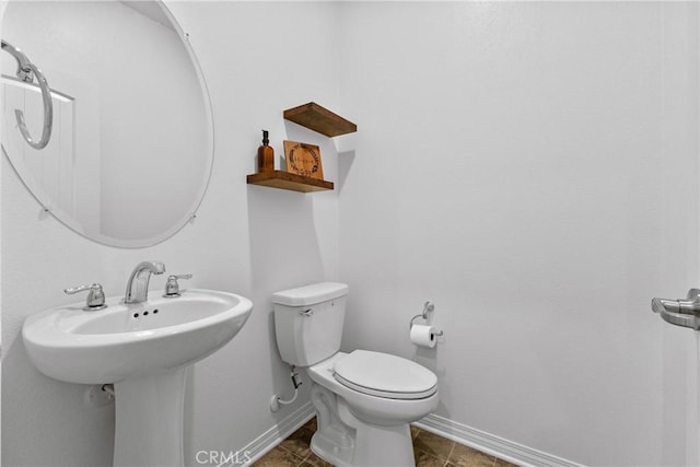 2694 Kings Canyon Dr, Jurupa Valley, CA 92509 - half bath featuring baseboards and tile patterned flooring