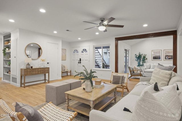 4071 Doane St, Ventura, CA 93003 - living room featuring a ceiling fan, recessed lighting, light wood-style flooring, and crown molding
